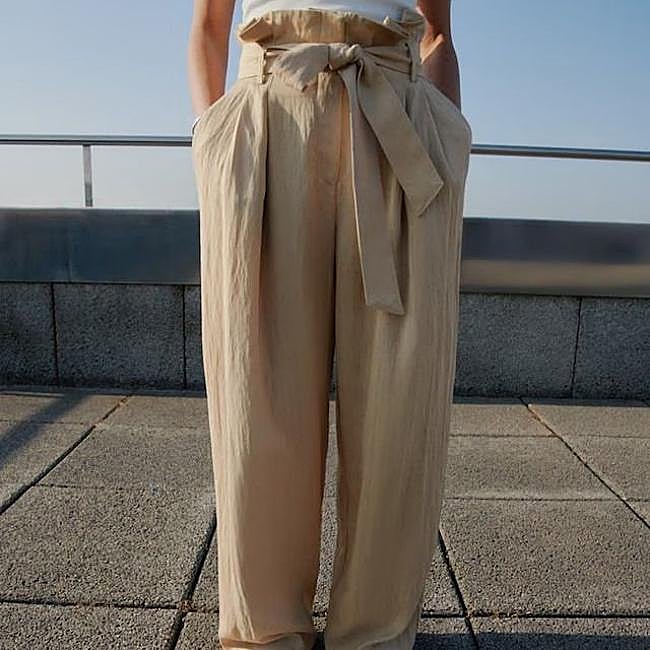 Pantalones fluidos paperbag con cinturón