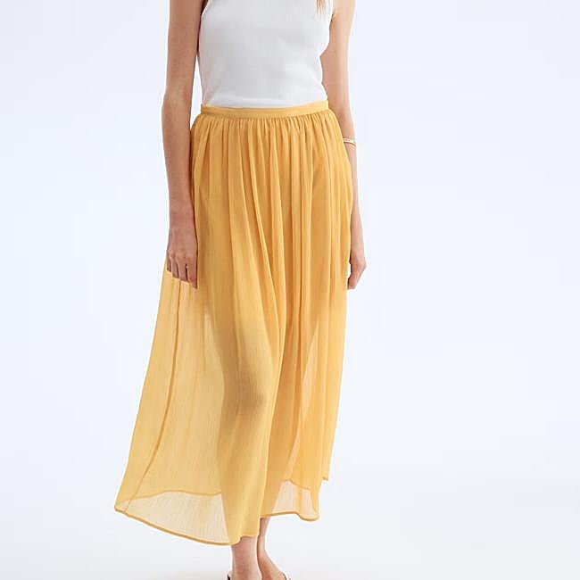 Falda fluid amarilla semitransparente