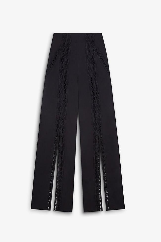 Los pantalones negros de Scalpers.