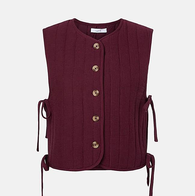 Chaleco de mujer acolchado con lazada lateral (25€)