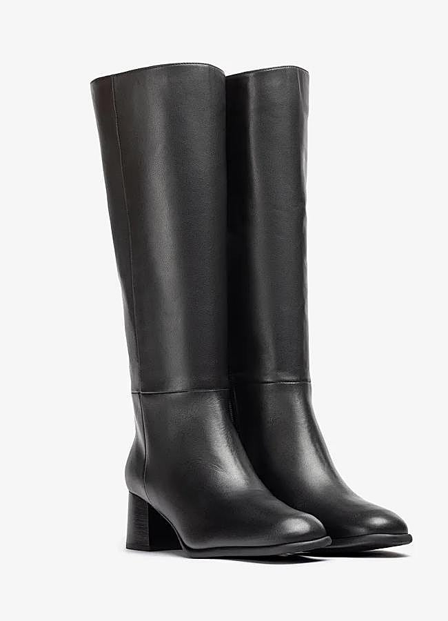 Imagen - Botas altas de piel negras con tacón cuadrado de Unisa, 129,90 euros.