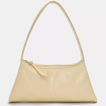 Imagen secundaria 1 - Look de Lady Pipa, bolso de Pull & Bear y pantalón pareo de Mango, todo en amarillo mantequilla.