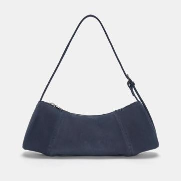 Imagen secundaria 1 - Bolso en serraje de Zara, bolso azul de Pull & Bear y bolso circular blanco de Simorra.