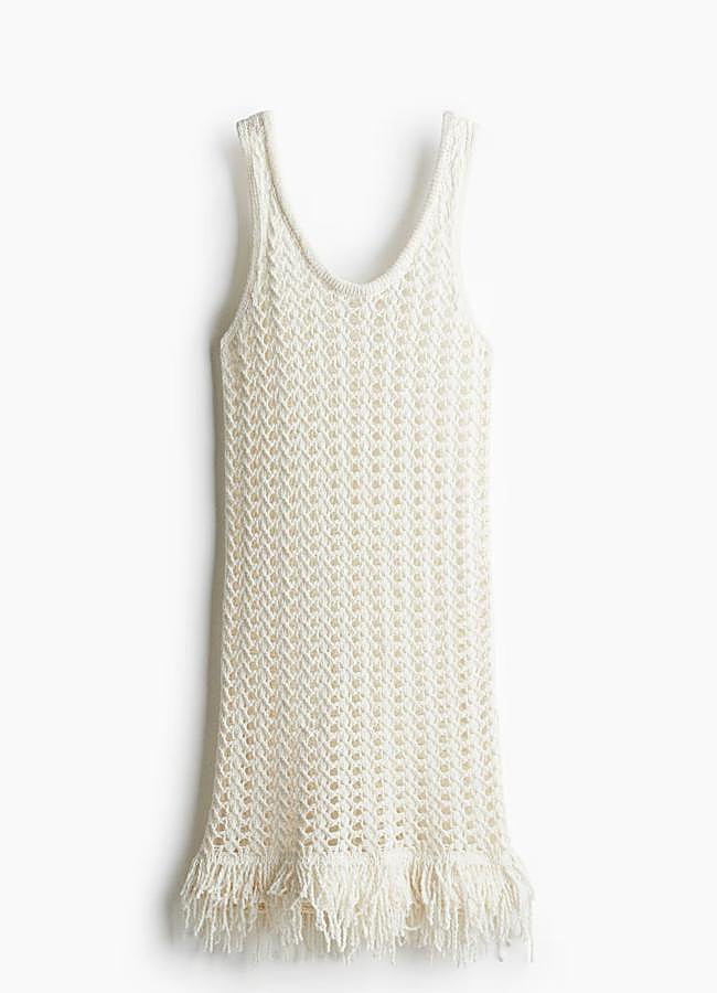 Imagen - Vestido en punto calado con flecos de H&M, 39,99 euros.