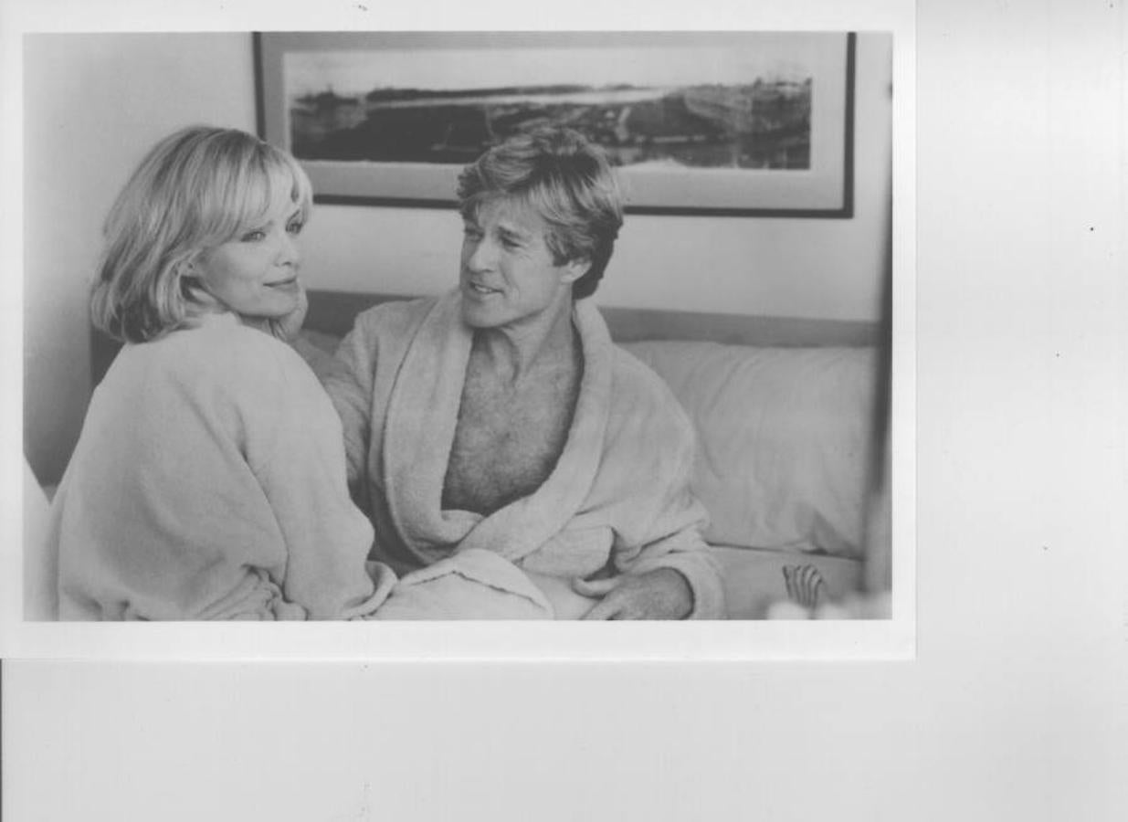 Michelle Pfeiffer y Robert Redford en una escena de la película 'Intimo y personal'.