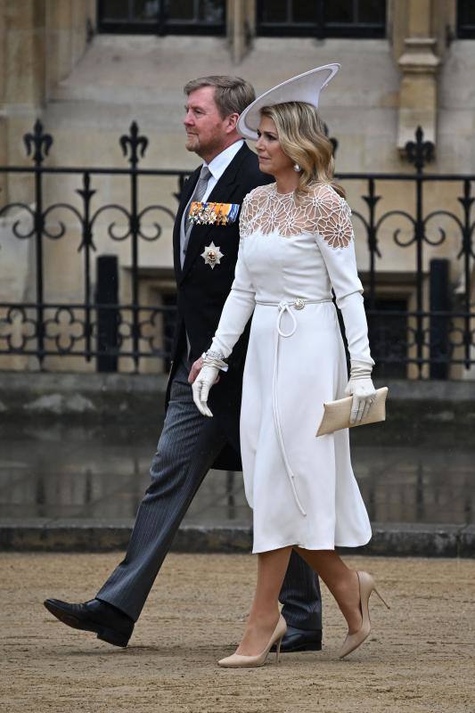 Guillermo y Máxima de Holanda, con un bonito vestido de su diseñador de cabecera, el holandés Jan Taminau. 