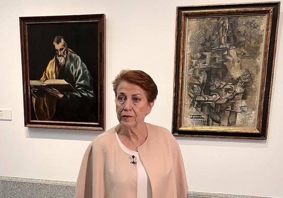 Carmen Giménez, comisaria de la muestra ante 'San Simón' del Greco y 'Tocador de mandolina' de Picasso.