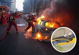 Los bomberos trabajan para apagar un automóvil en llamas durante una manifestación en Nanterre. En el círculo, el coche donde viajaba el joven fallecido.