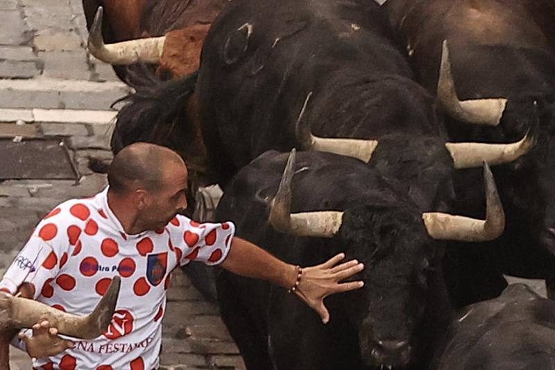 El sexto encierro de San Fermín, en imágenes