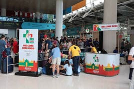 Peregrinos a su llegada al aeropuerto Humberto Delgado de Lisboa para la JMJ