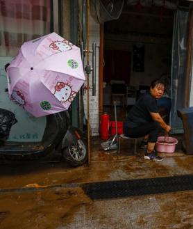 Imagen secundaria 2 - China intensifica los rescates tras contabilizar 20 muertos y 19 desaparecidos por las lluvias torrenciales