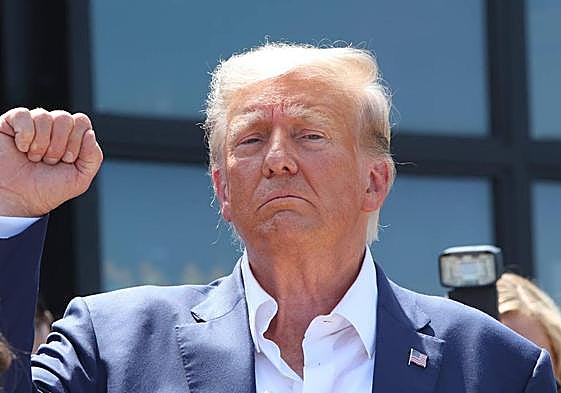 El expresidente estadounidense Donald Trump asiste a la Feria Estatal de Iowa