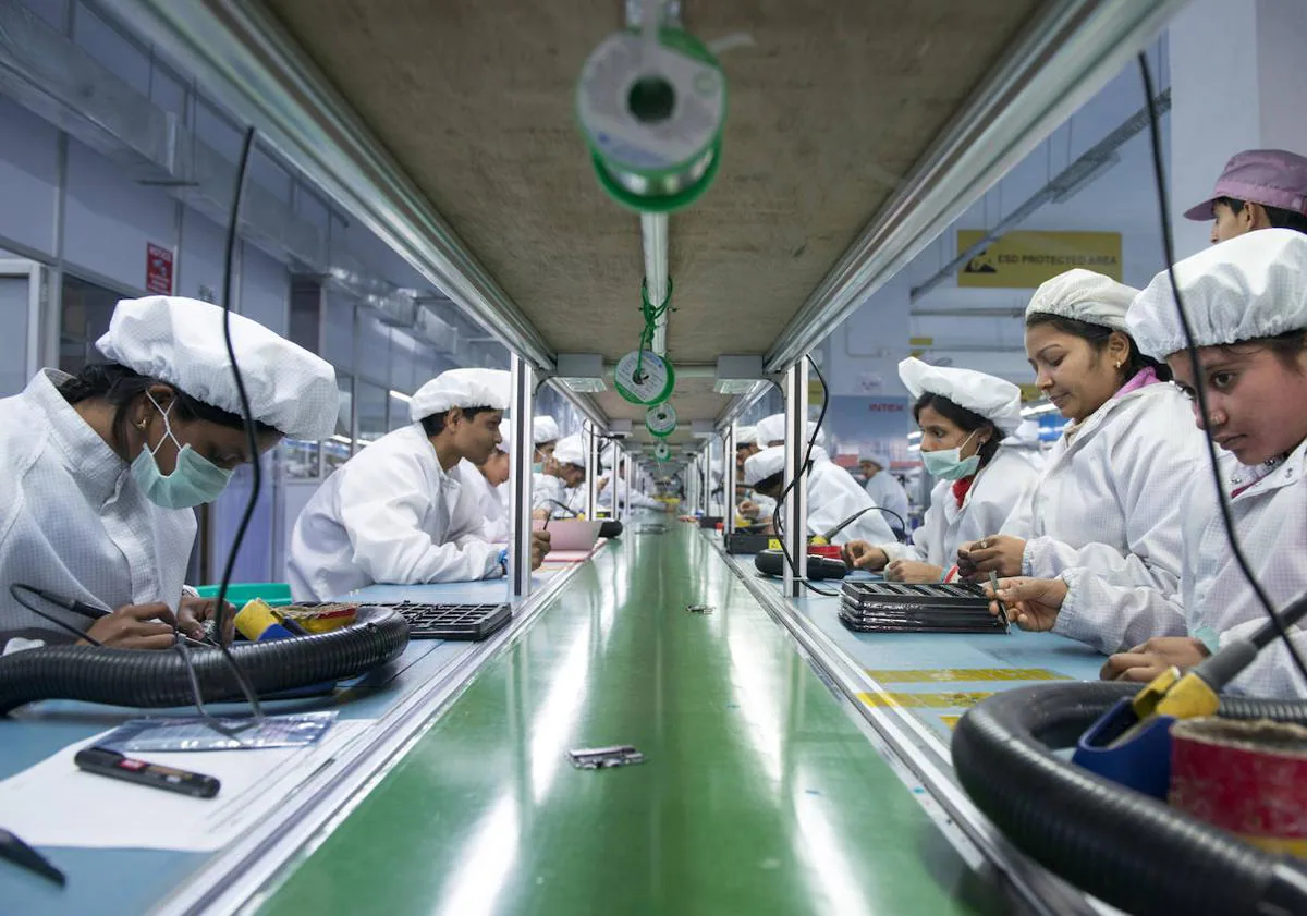Main image - Interior of an Intex mobile phone factory in Bengaluru.