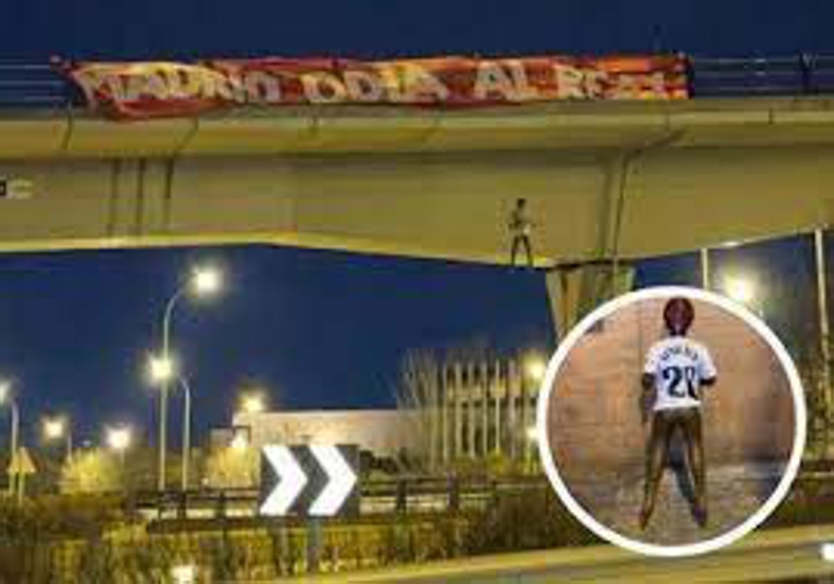 La pancarta y la muñeca hinchable con la camiseta de Vinicius colocada en un puente de la carretera M-11 de Madrid.