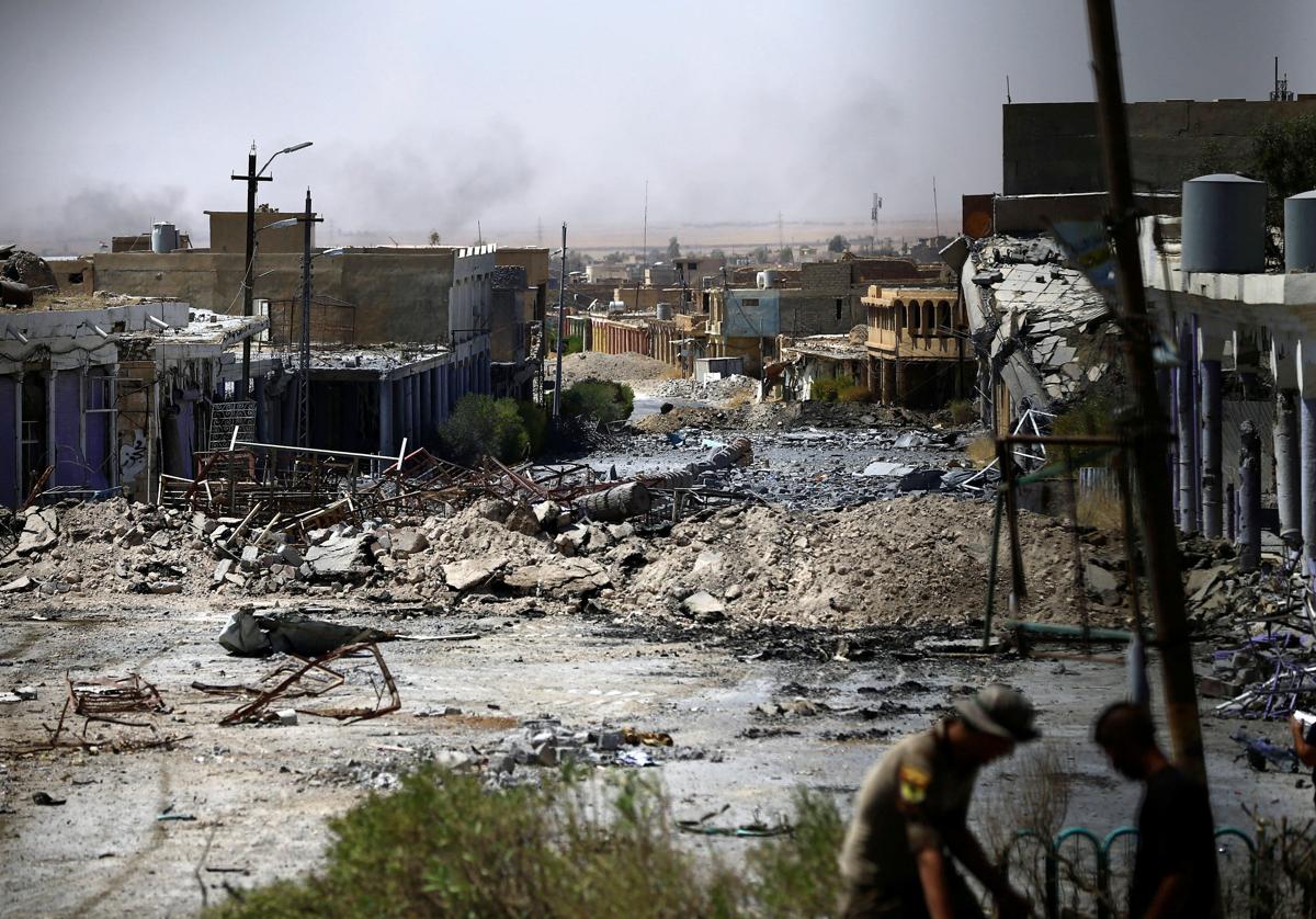 Edificios destruidos por los enfrentamientos, durante la guerra entre el Ejército iraquí y las Fuerzas de Movilización Popular chiítas (PMF) contra los militantes del Estado Islámico en Tal Afar.