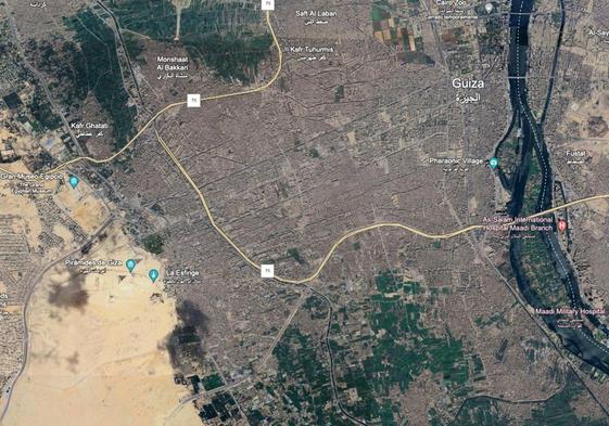Las pirámides de Guiza a la izquierda, separadas del Nilo por un barrio de El Cairo.