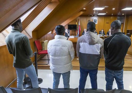 Los cuatro acusados, durante el juicio celebrado esta mañana.