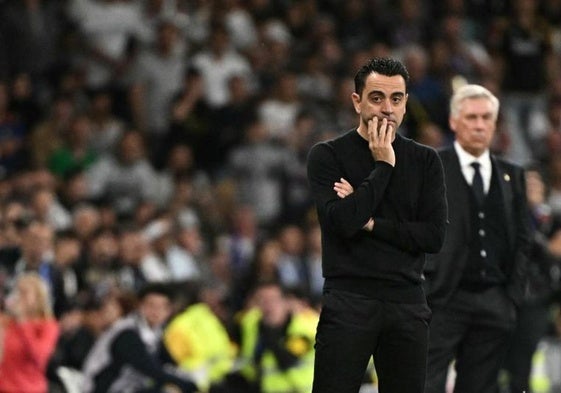 Xavi Hernández, durante el clásico disputado el domingo en el Bernabéu.