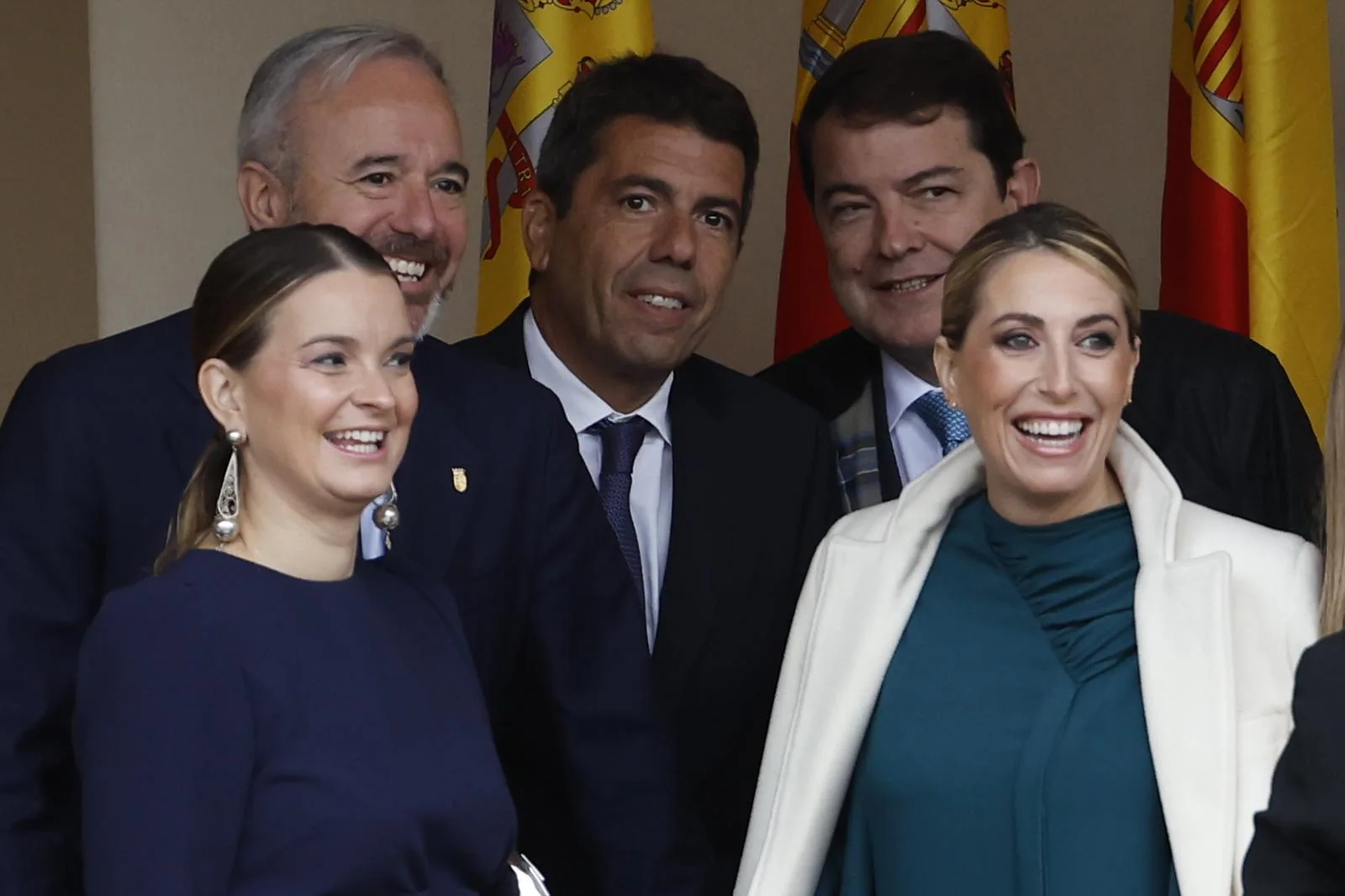 Los presidentes de Baleares, Marga Prohens, Aragón, Jorge Azcón, Comunidad Valenciana, Carlos Mazón, de Castilla y León, Alfonso Fernández Mañueco, y Extremadura, María Guardiola, a su llegada este sábado para asistir al desfile por el Día de la Fiesta Nacional.