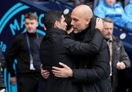 MIkel Arteta y Pep Guardiola, en un partido de la Premier League