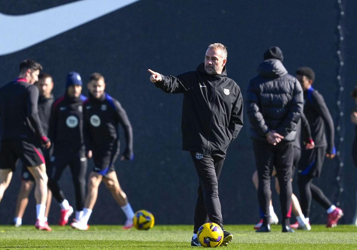 Hansi Flick leads a Barcelona training session ahead of their visit to Sevilla.