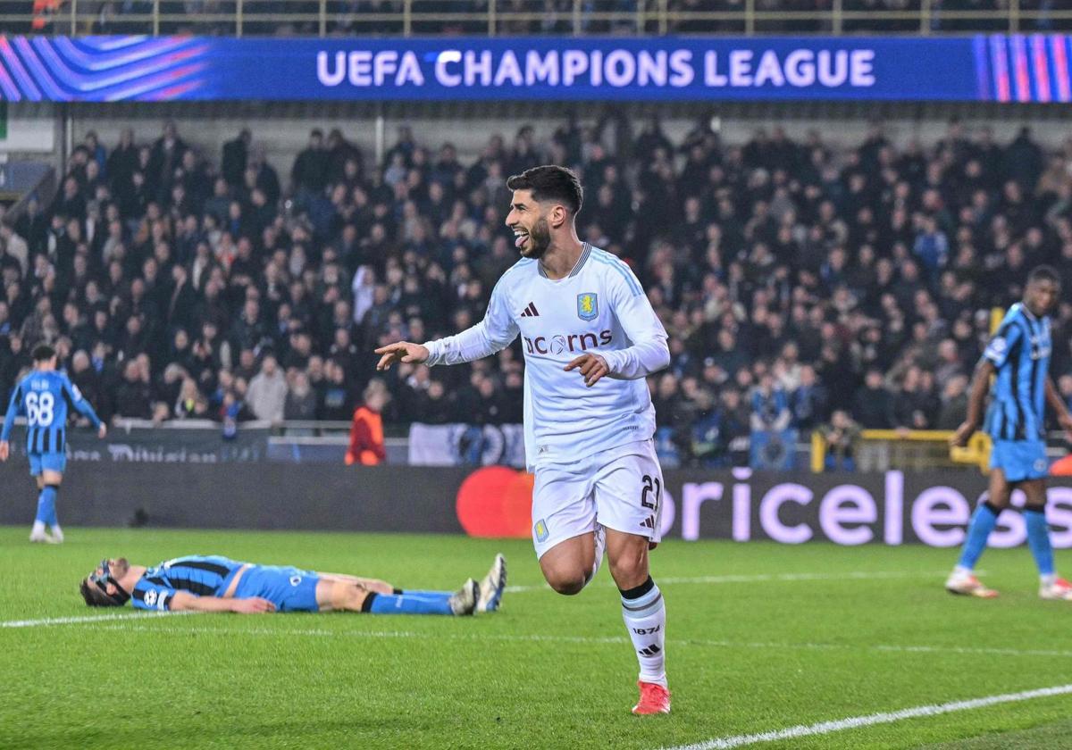 Marco Asensio celebrates his penalty goal against Club Brugge.