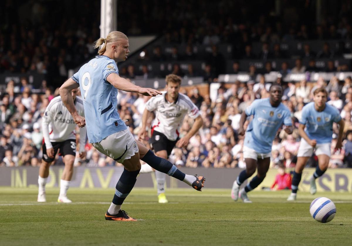 Erling Haaland takes a penalty against Fulham