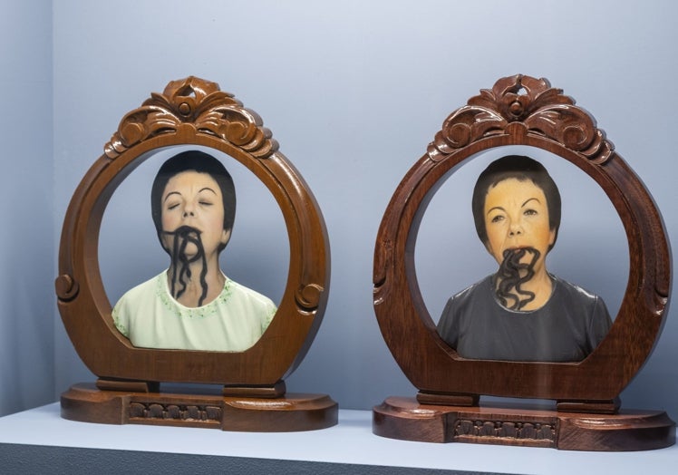 Self-portraits with snakes.