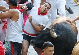 El tercer encierro de San Fermín 2025, en imágenes