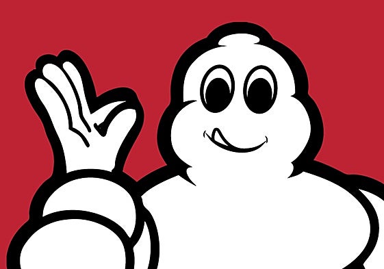 El muñeco de Michelin se llama Bibendum.También es popularmente conocido como el «Hombre Michelin» o «Michelin Man» en inglés. Su nombre proviene de la frase en latín «Nunc est bibendum», que significa «Ahora es el momento de beber», que aparecía en un antiguo póster publicitario