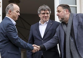 Jordi Turull, Charles Puigdemont y Oriol Junqueras en Waterloo.
