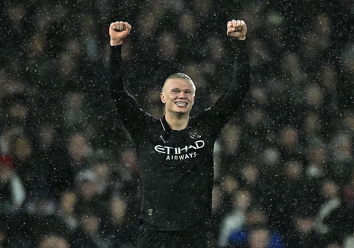 Erling Haaland celebrates his 100th goal in the Premier League.