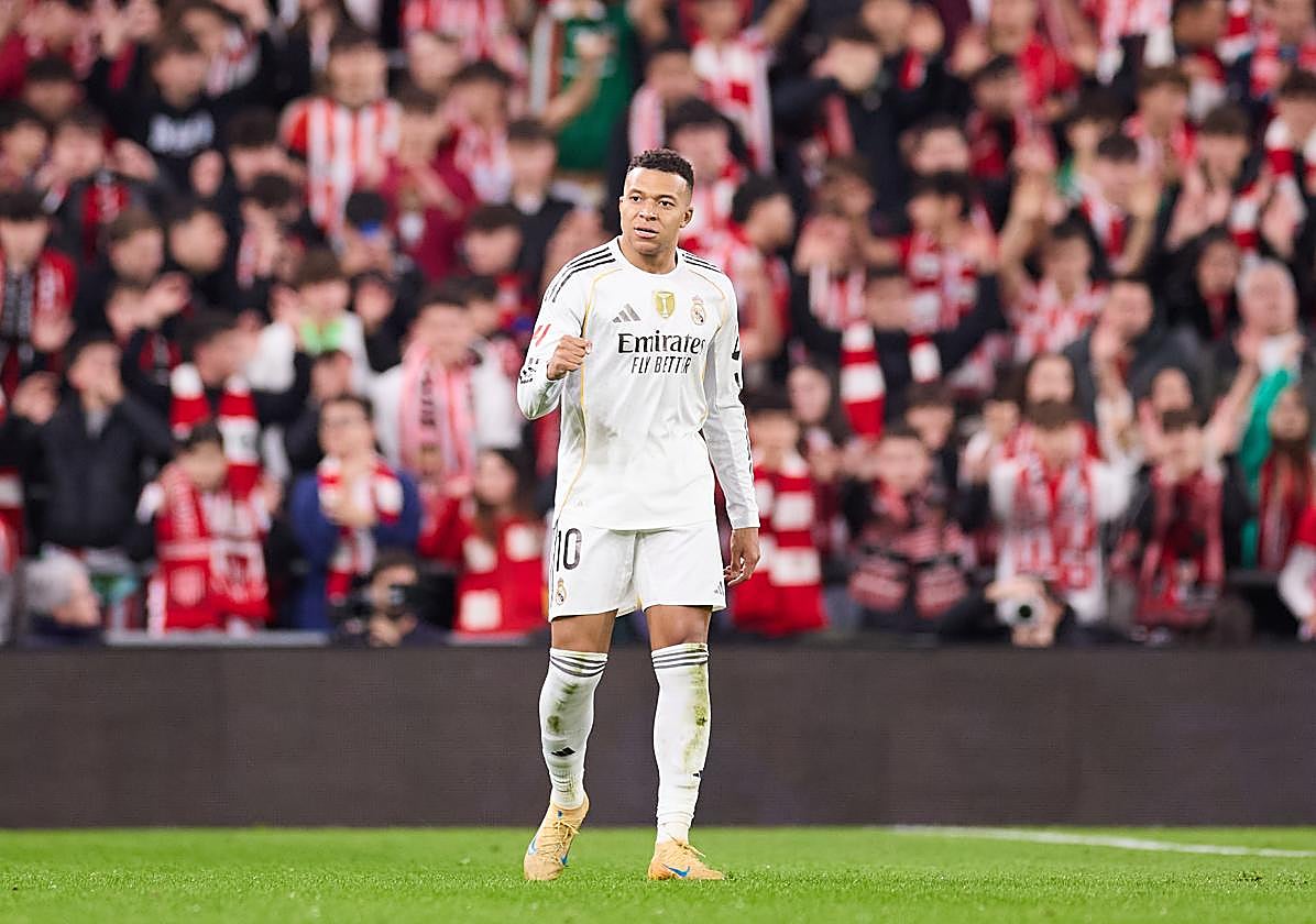 Kylian Mbappé celebrates the first of his two goals at San Mamés.