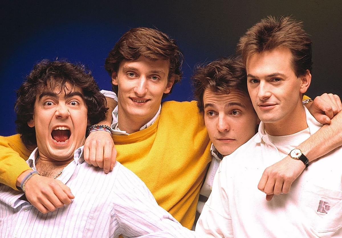 Javi Molina, Dani Mezquita, David Summers y Rafa Gutiérrez en una imagen promocional de Hombres G en los años 80.