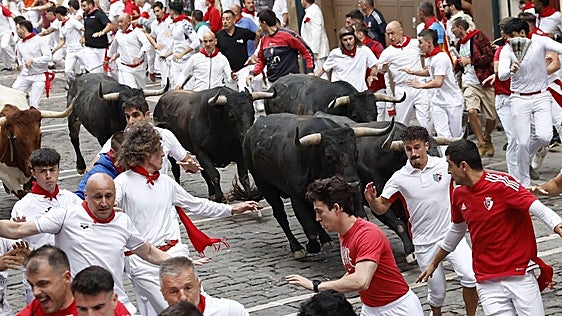 El séptimo encierro de San Fermín, en imágenes