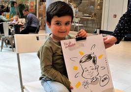 Niño participando en una de las actividades de la Feria