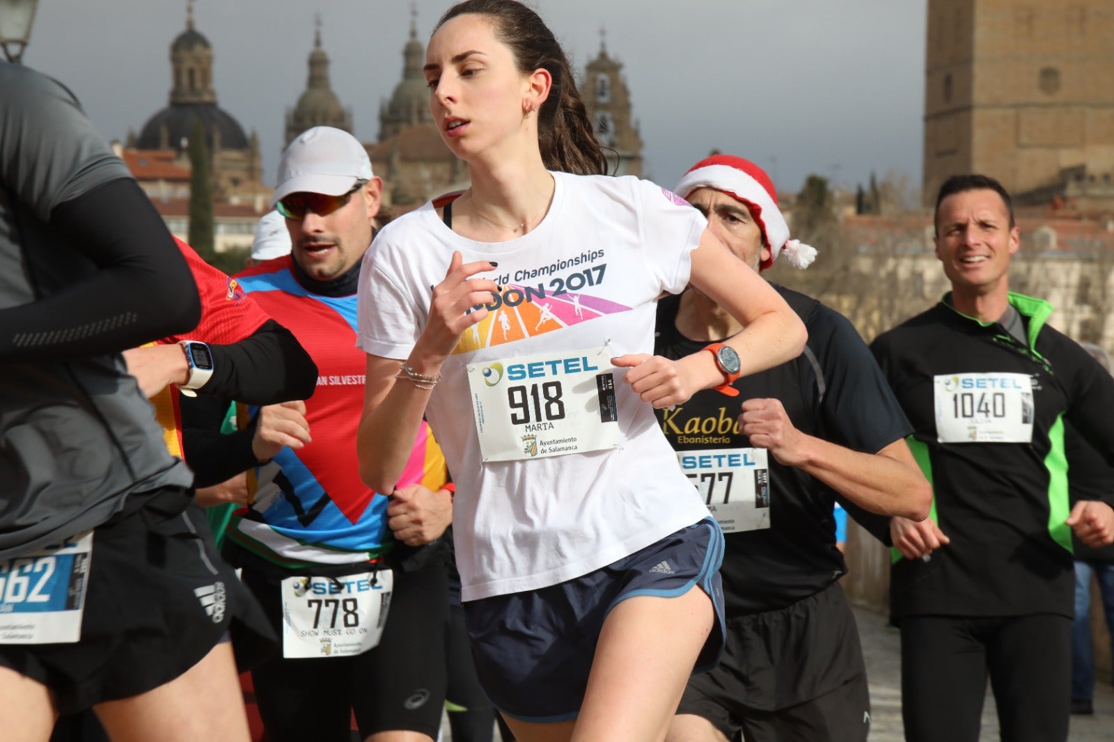 San Silvestre Salmantina: paso por el Puente Romano y calle Compañía