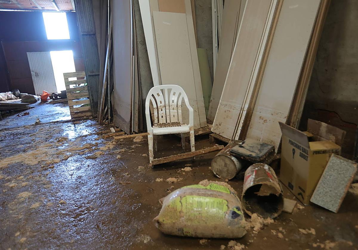 Imagen de archivo de un almacén afectado por las inundaciones en Aldeatejada.