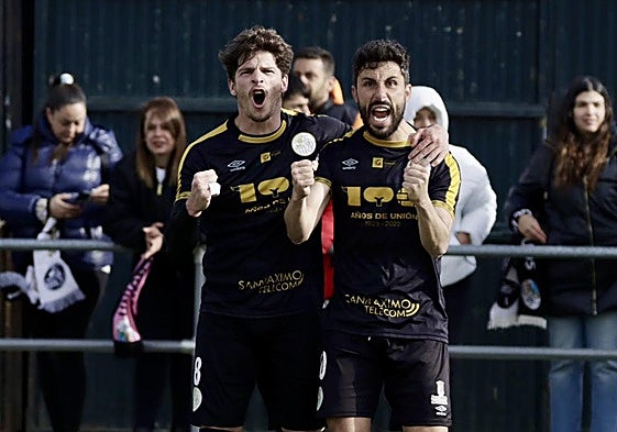 Amaro y Diego Benito celebran el 0-1.