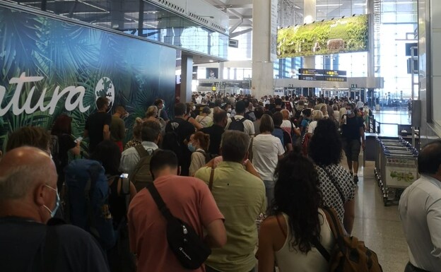 A long queue for the security checkpoint at Malaga Airport.