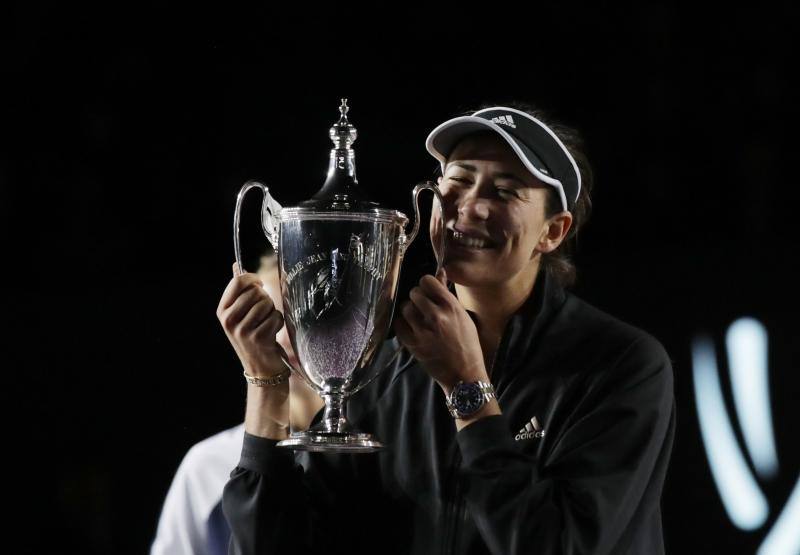 Muguruza celebrates winning the WTA tournament in Mexico