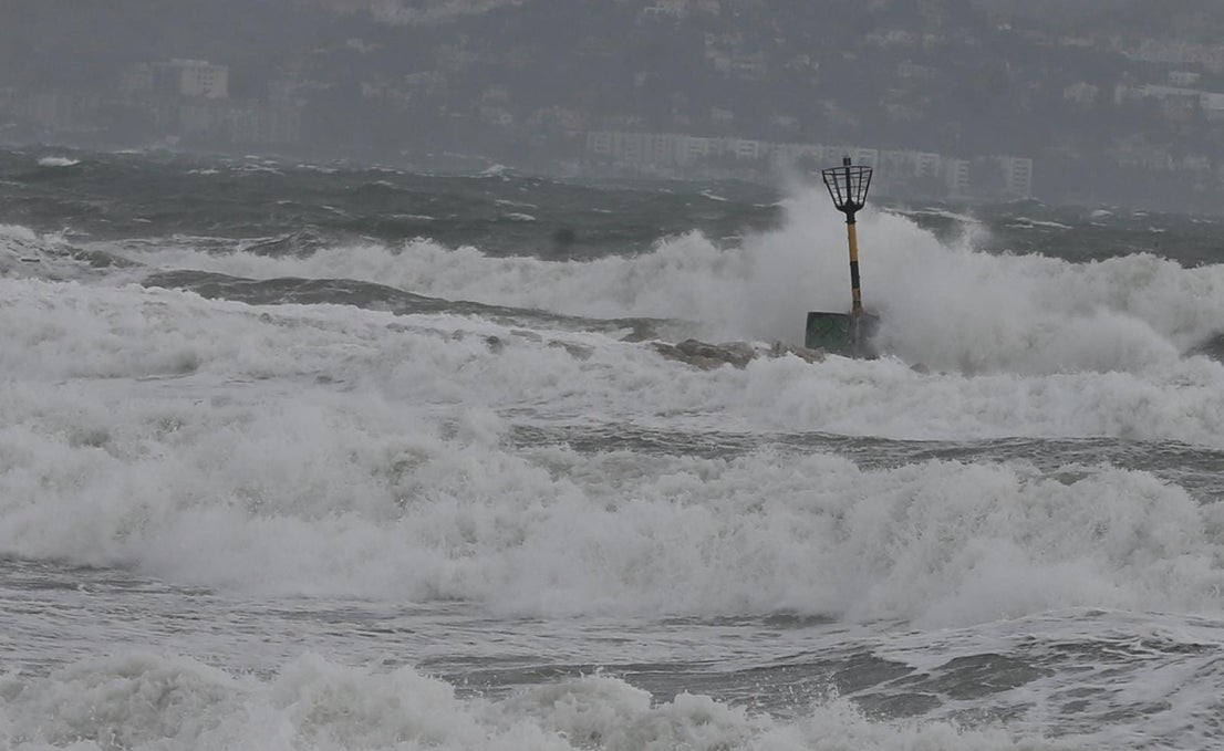Two people were injured in Malaga province and a beach bar in Fuengirola was flattened . 