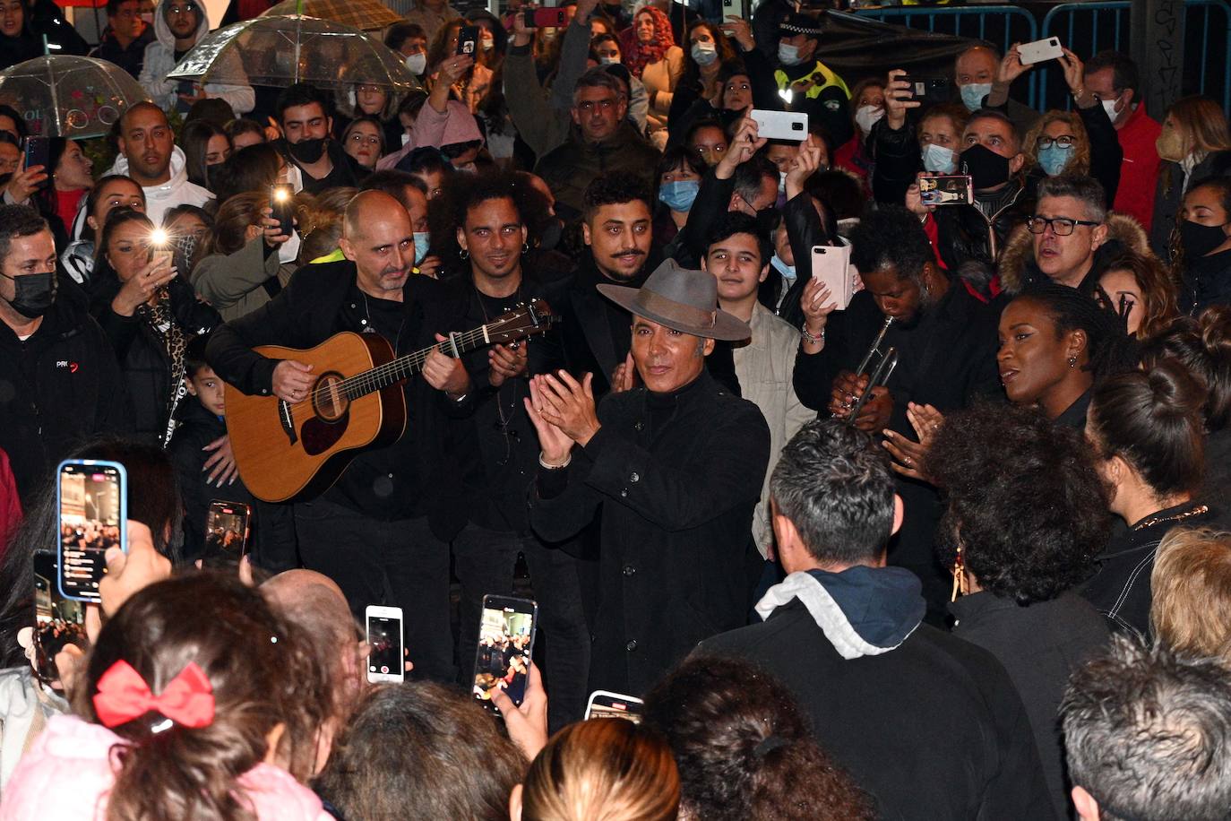 Crowds gathered at Marbella's Christmas lights despite the threat of rain.