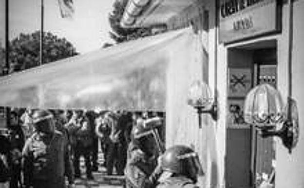 The Guardia Civil breaking down the door of the Nerja cave 