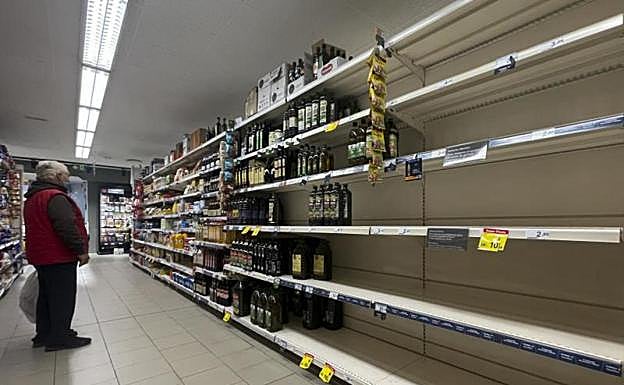 Empty supermarket shelves.