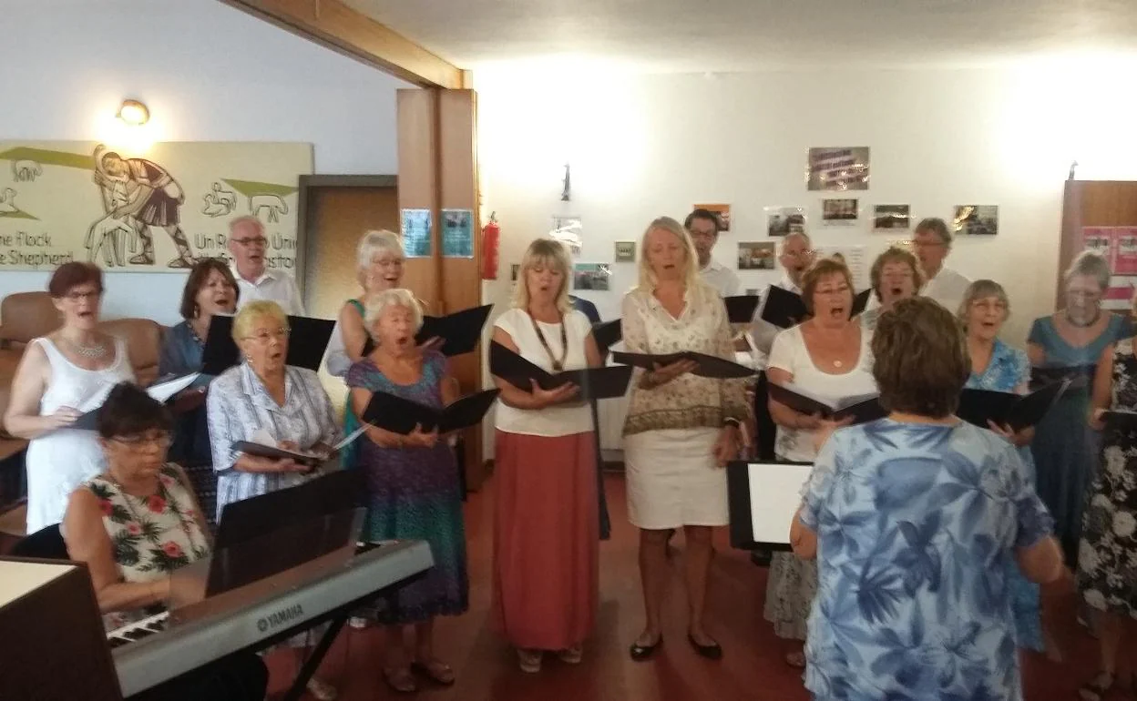 The TIMS choir in rehearsals for a previous show. 