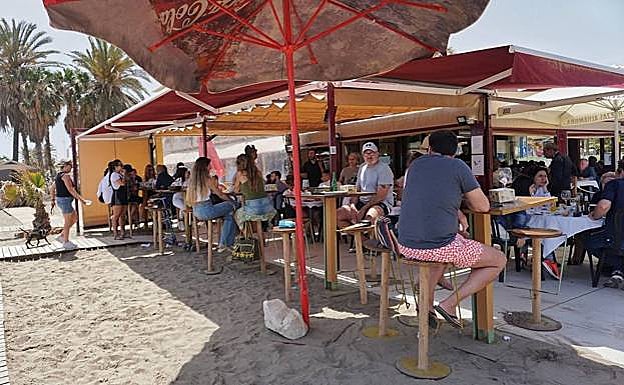 A busy beach bar on La Misericordia beach 