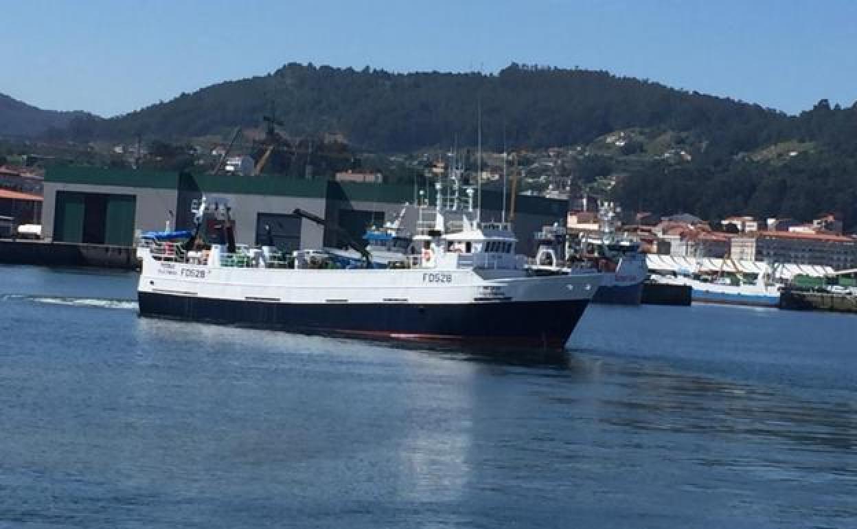 A Galician fishing boat is adrift and on fire in Irish waters, with a heavy list to port