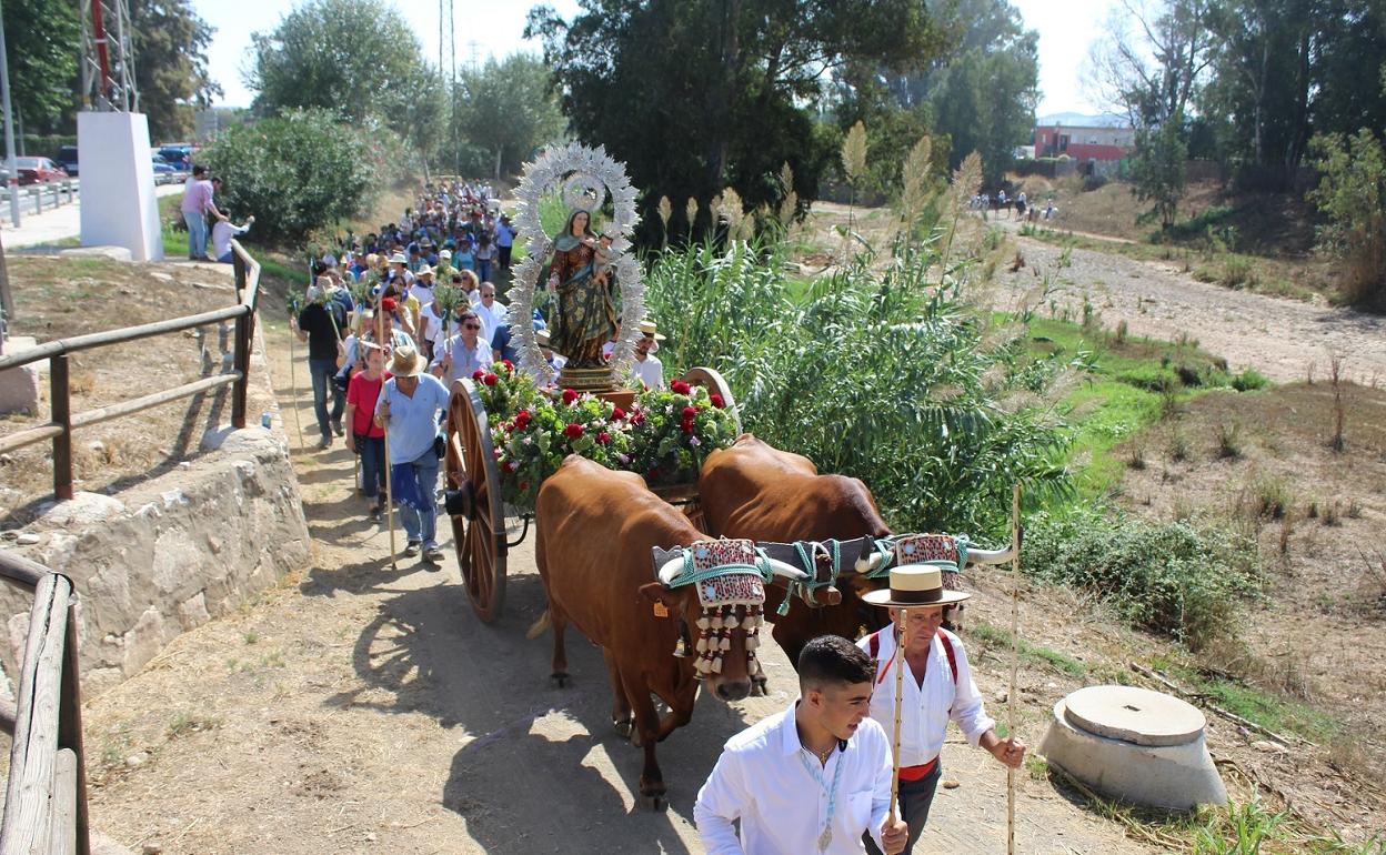 Pilgrims on route to the Parque El Esparragal during the romeria in 2019. 
