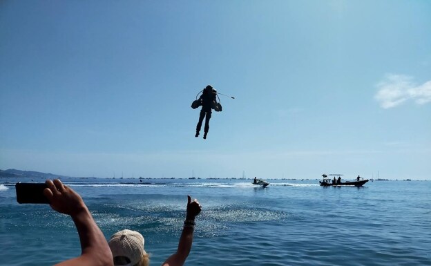 Richard Browning in his Gravity Jet Suit flew along Torre del Mar's coastline 
